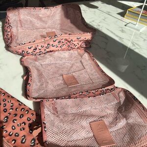 Pink leopard travel bags – five piece set. Never used.